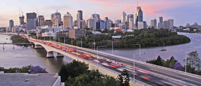 Vehicle passing on busy bridge