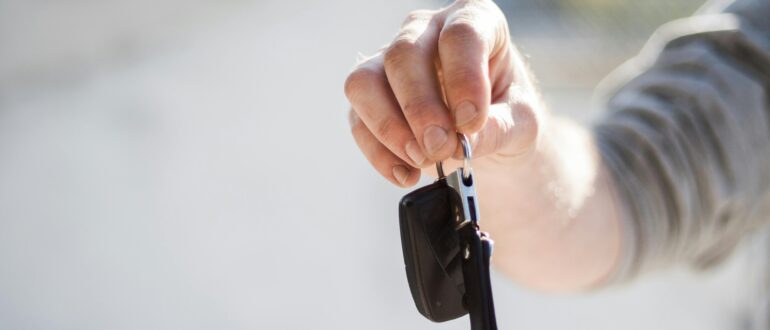 hand holding car keys